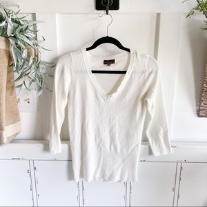 White V neck sweater